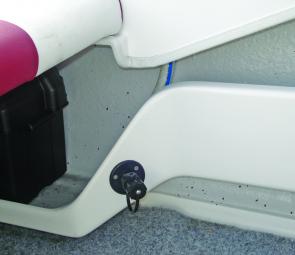 Full length fibreglass side pockets drop down and widen at the stern to provide a stack of storage and a carry tray for the battery and oil bottle.